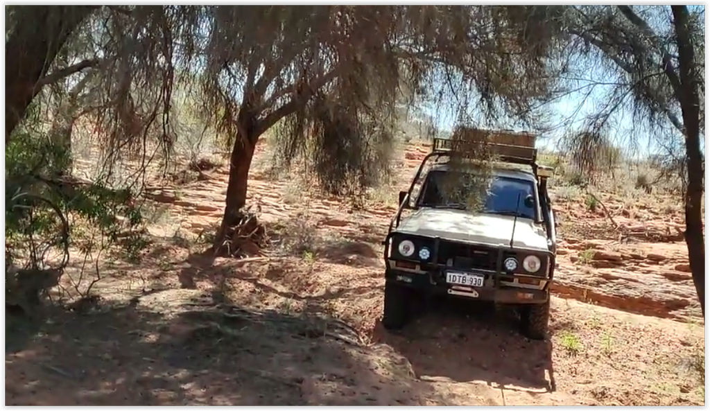 Dry Creek crossing alongside vermin proof fence